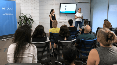 Hayley and Emily Presenting at Reload's Open Studio 2018